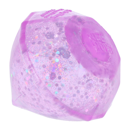 A pink, diamond-shaped NeeDoh Groovy Jewel squishy filled with glitter